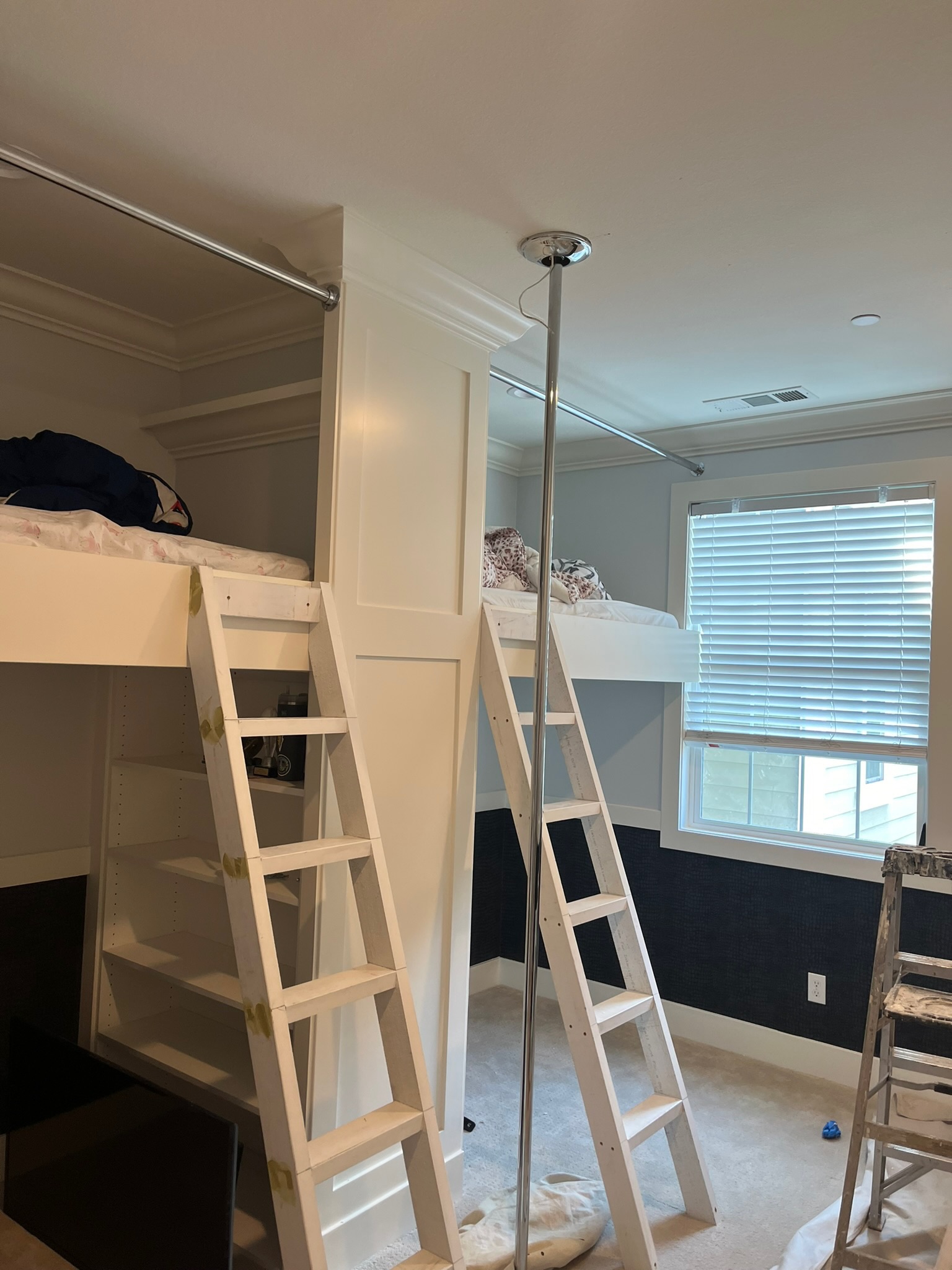 Built-in bunk beds with ladders
