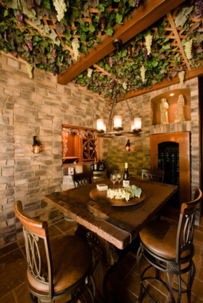 Grapevine-ceiling wine tasting room with stone walls